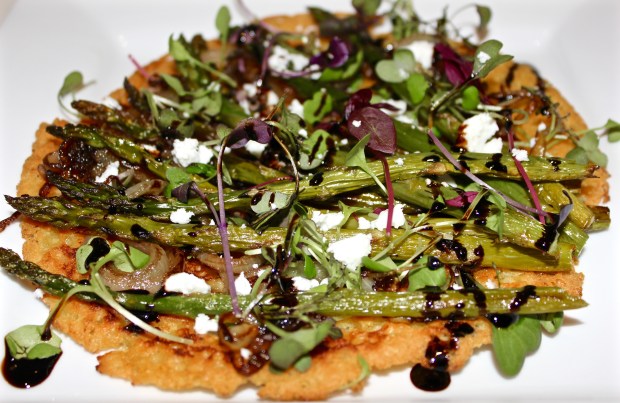 Socca with Carmelized Onion, Asparagus & Sprouts